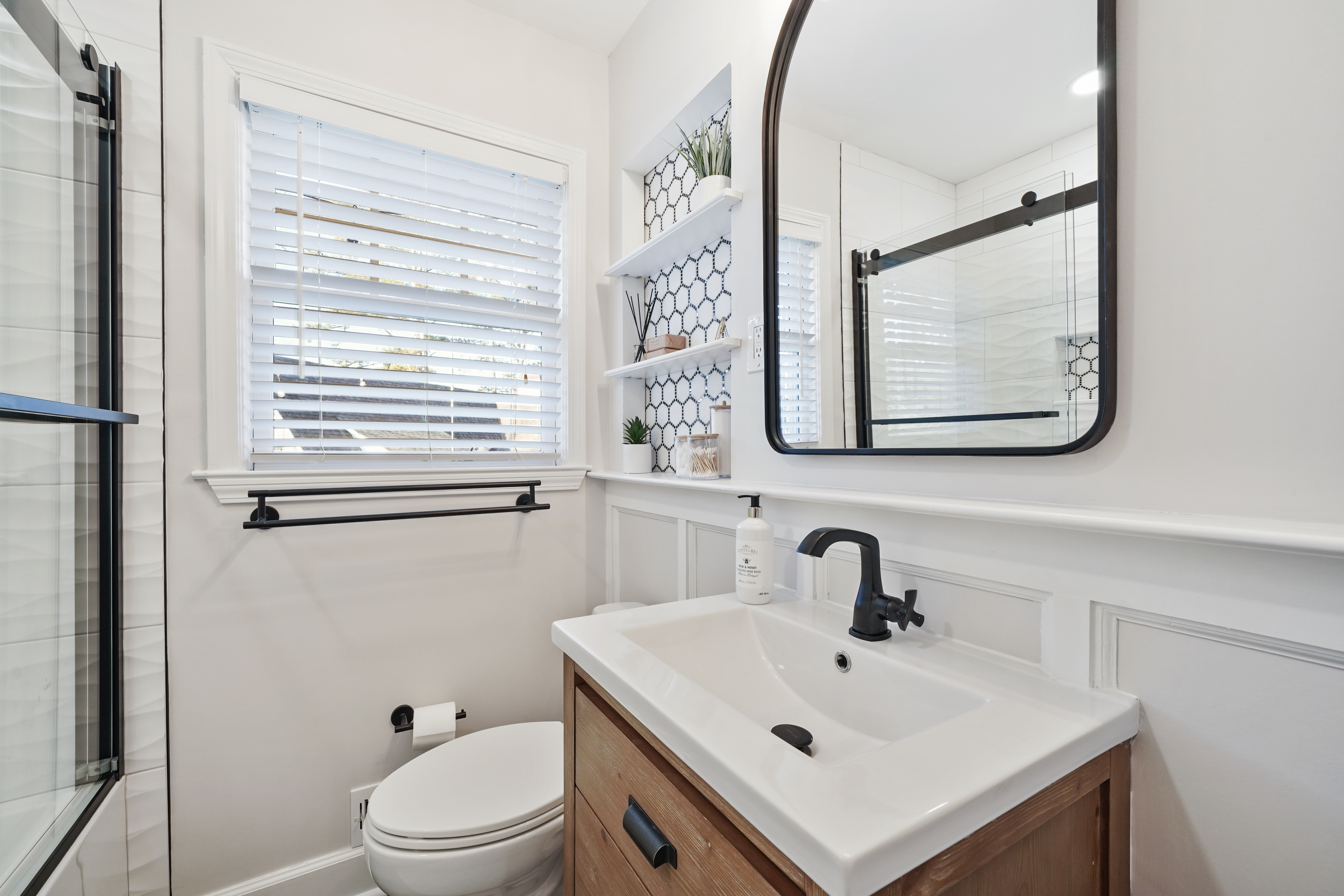 Compact bathroom with geometric tile