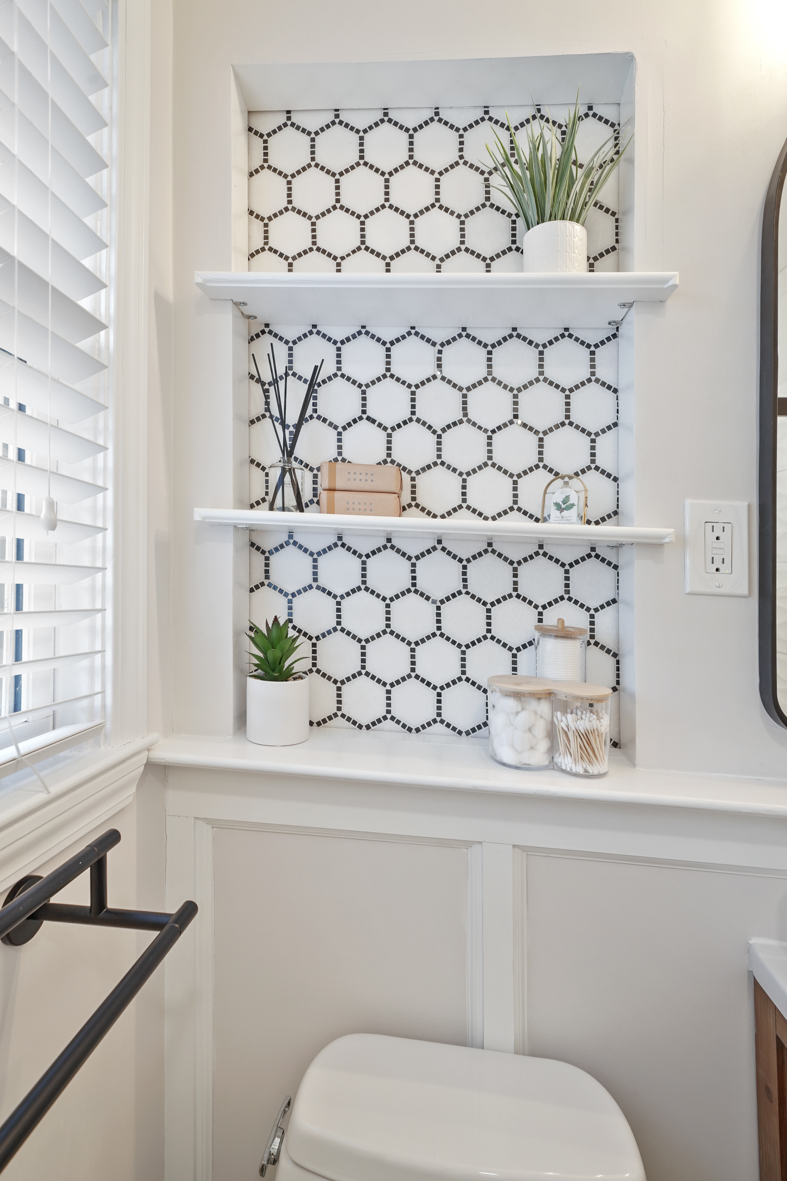 Bathroom with hexagonal tile feature