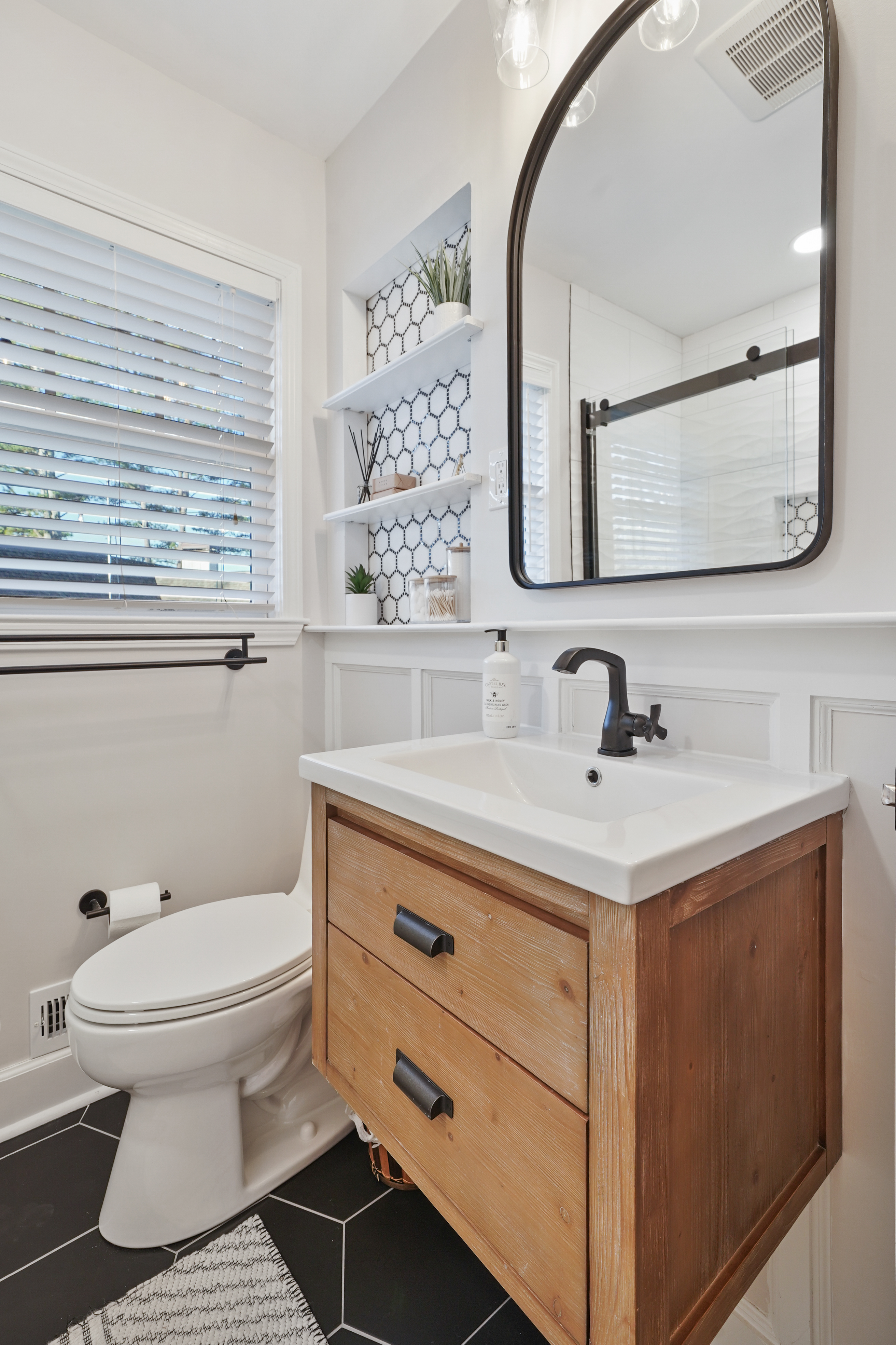 Modern bathroom with wood vanity