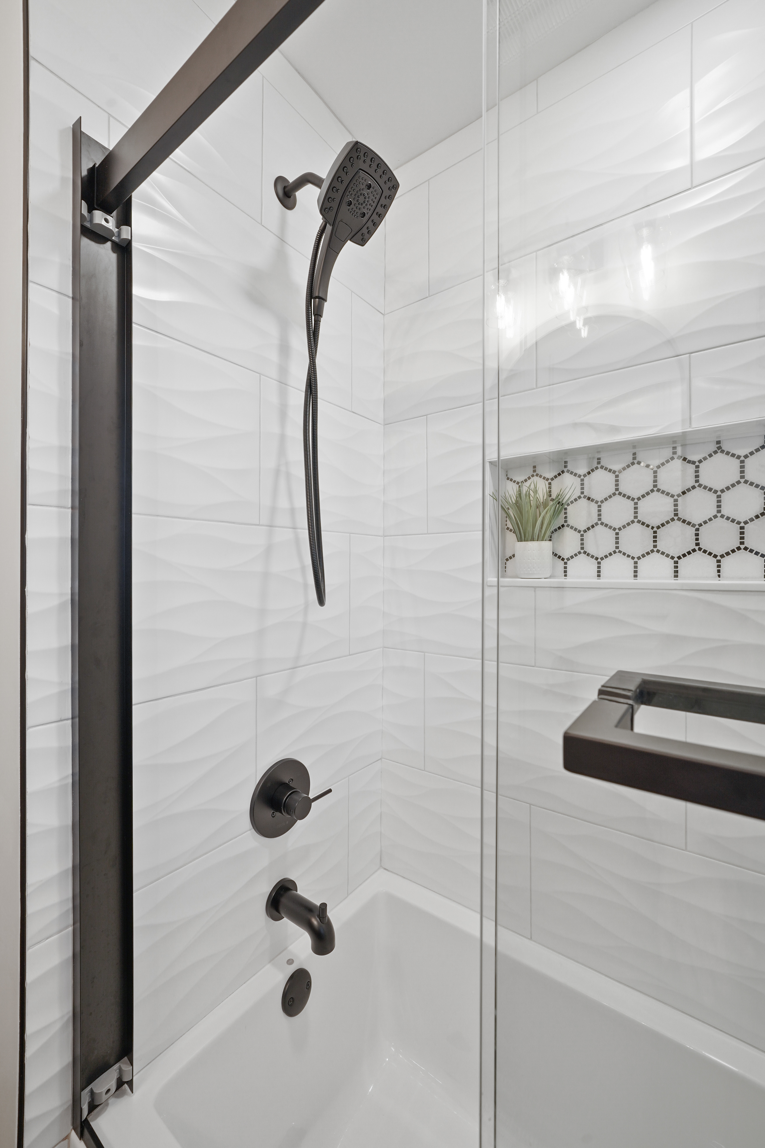 Subway tile shower with built-in niche