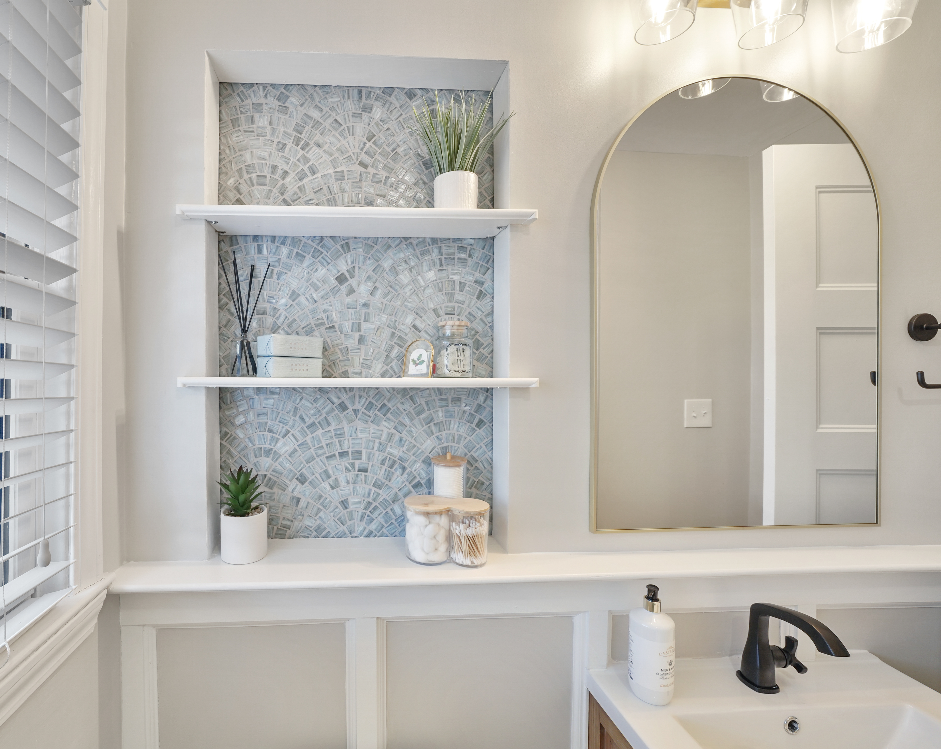 Bathroom with mosaic tile accent